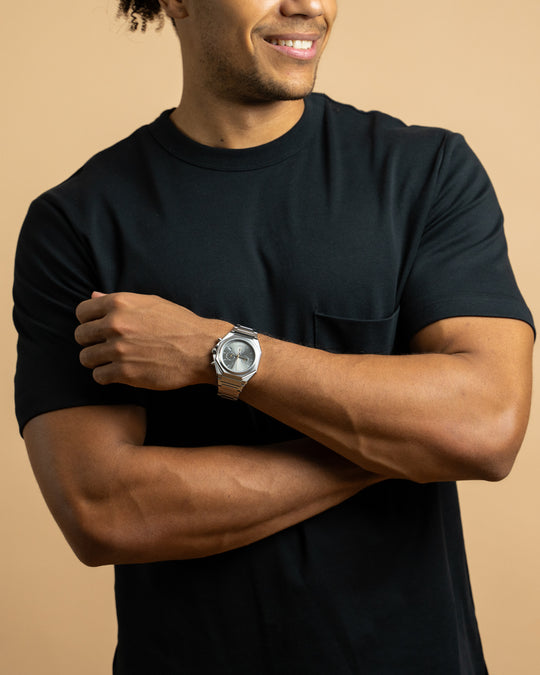 44mm Swiss chronograph watch with silver case and strap