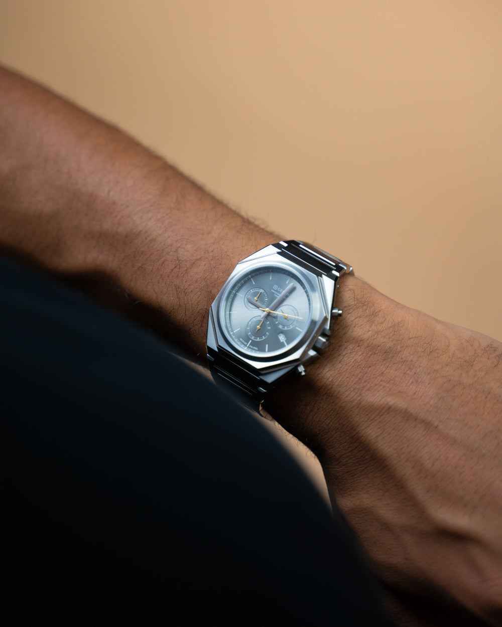 44mm Swiss chronograph watch with silver case and strap