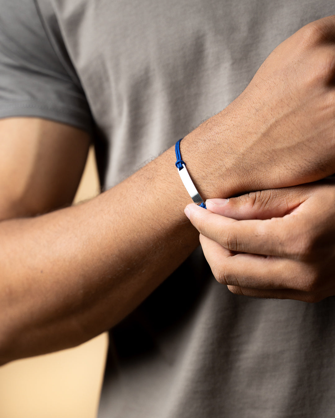 Blue nylon bracelet with an engraving plate