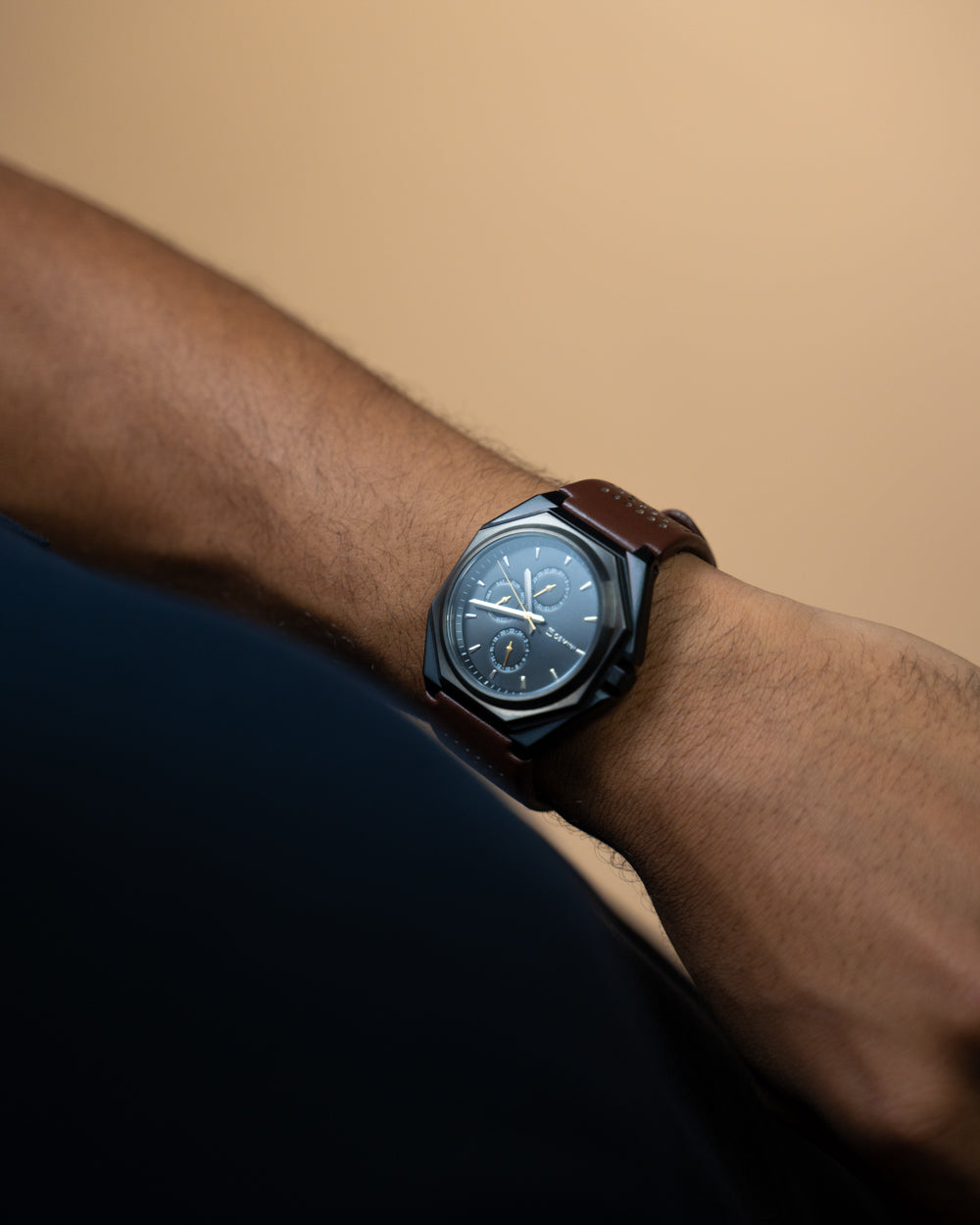 44mm dark grey steel watch with brown Italian leather strap