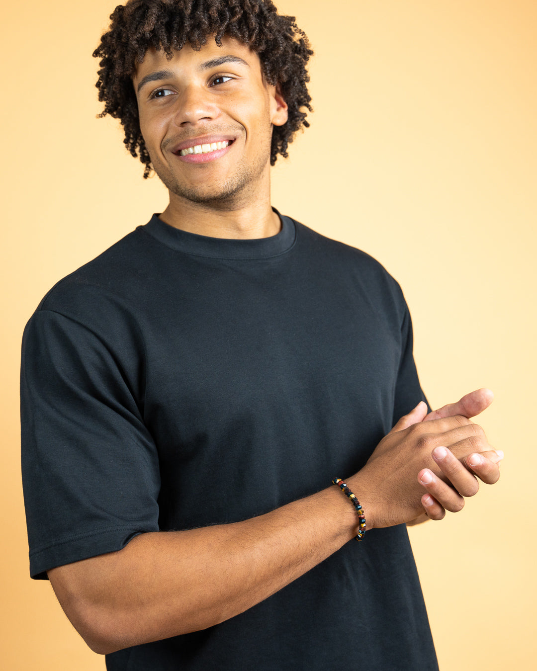 Exclusive bracelet with hand-cut Tiger Eye stone and 18k gold plating