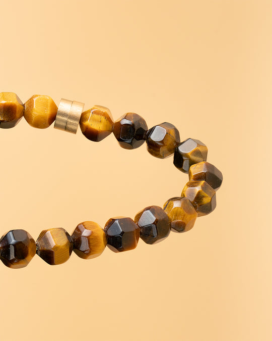 Bracelet with 6mm Tiger Eye stone and titanium element