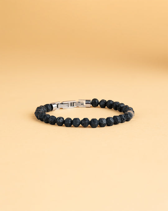 Bracelet with 6mm black Lava stone and titanium element