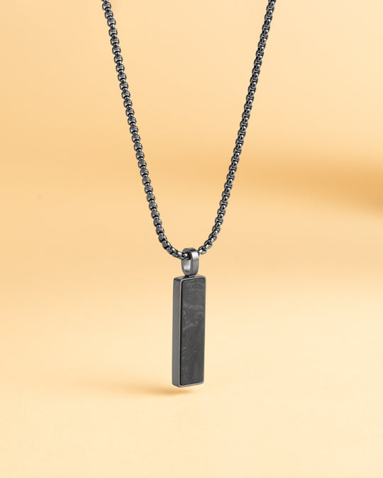 Black stainless steel necklace with a forged carbon finish