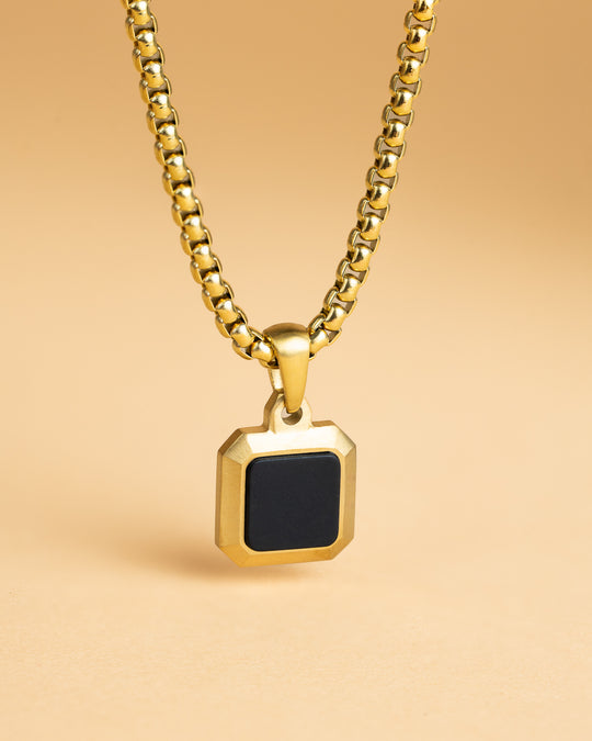 Titanium/Steel necklace with an 18kt gold finish and Black Agate stone