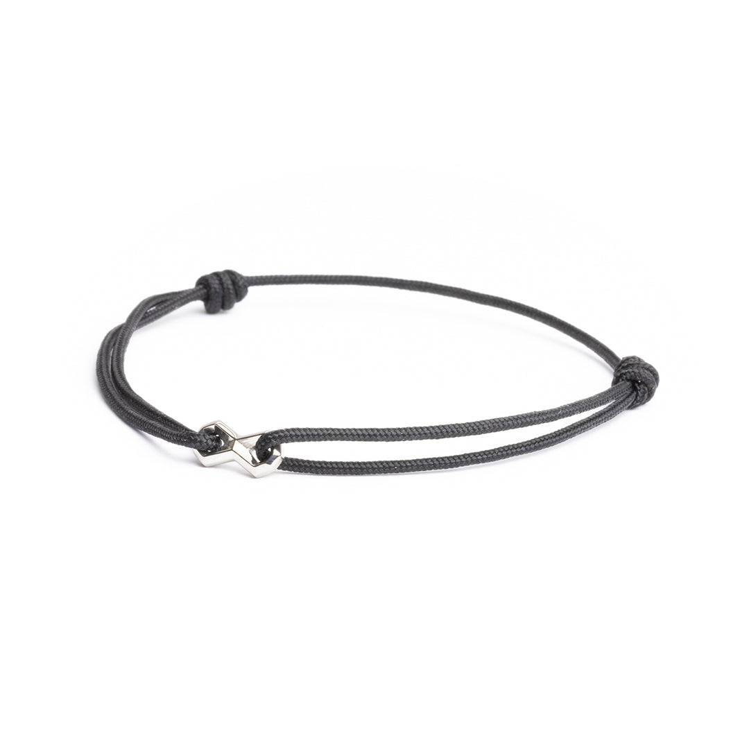 Black nylon bracelet with a silver infinity sign