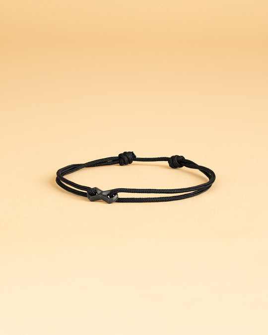 Black nylon bracelet with a black infinity sign