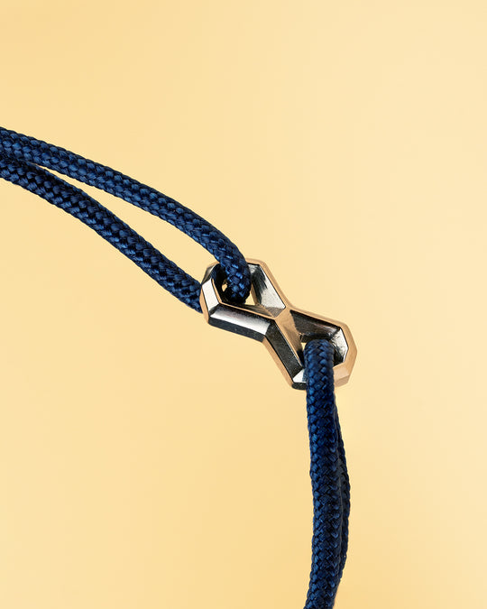 Blue nylon bracelet with a silver-plated infinity sign