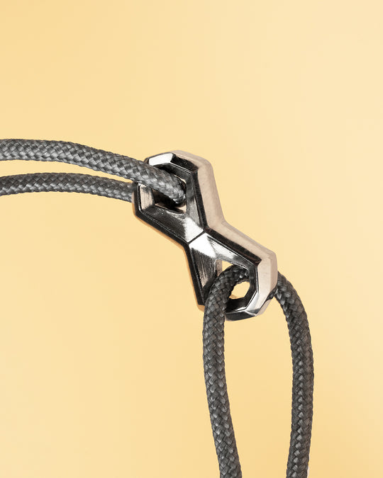 Grey nylon bracelet with a silver-plated infinity sign