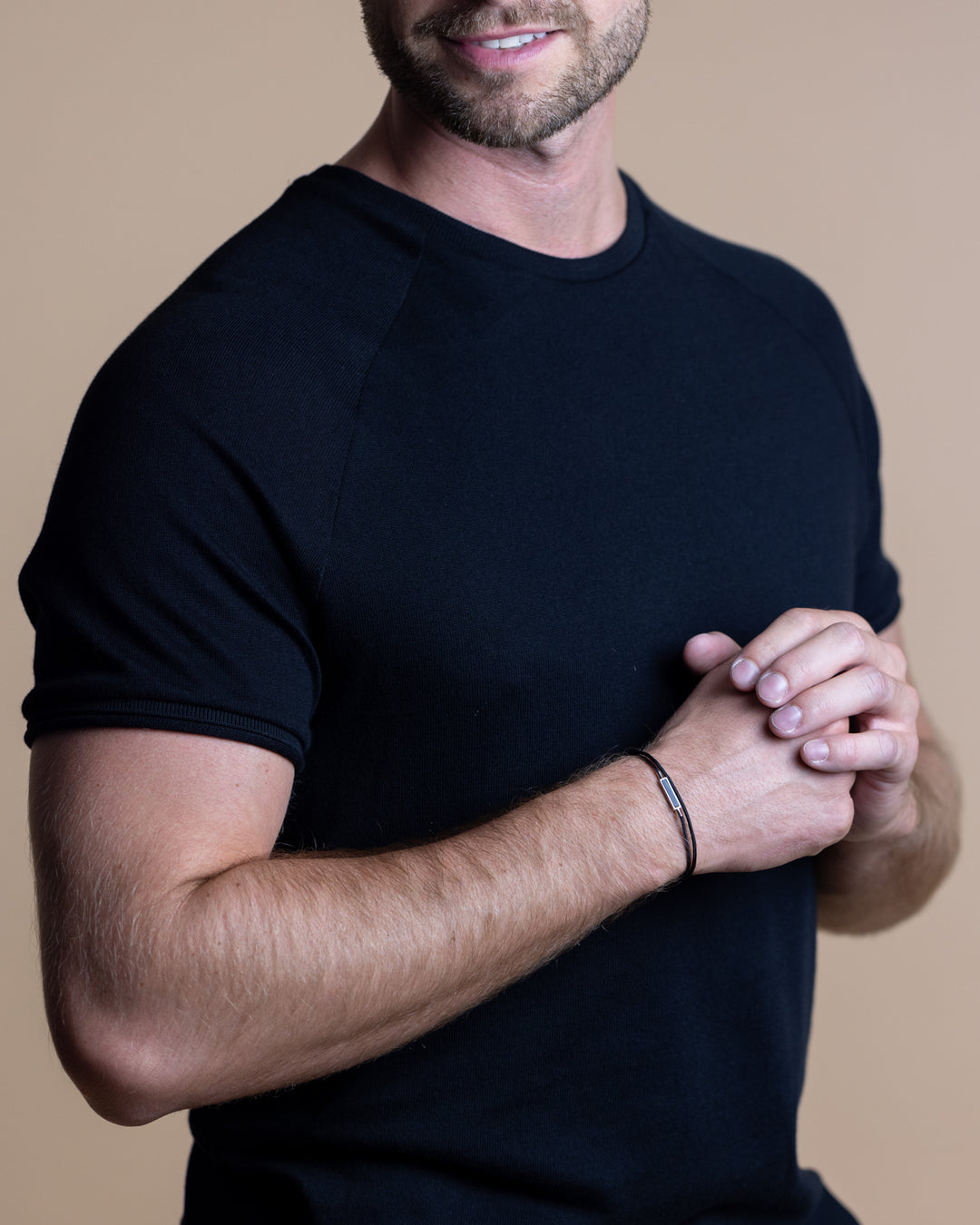 Black nylon bracelet with a carbon fiber element