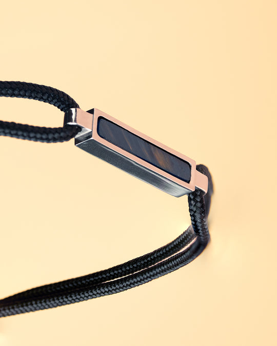 Black nylon bracelet with a carbon fiber element