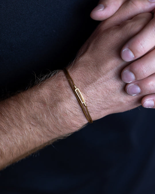 Brown nylon bracelet with a Tiger Eye stone element