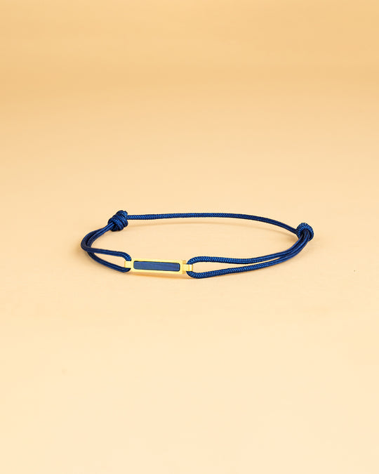 Blue nylon bracelet with a gold-plated Blue Tiger Eye element