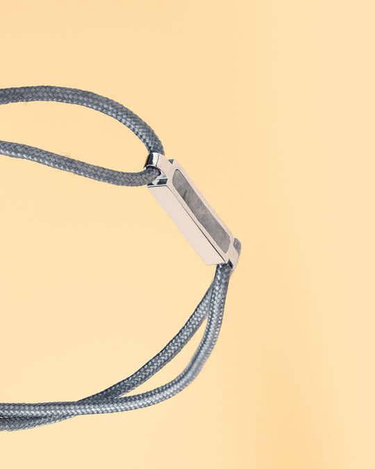 Grey nylon bracelet with a Larvikite stone element