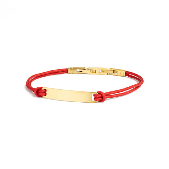 Red nylon bracelet with a gold-plated engraving plate