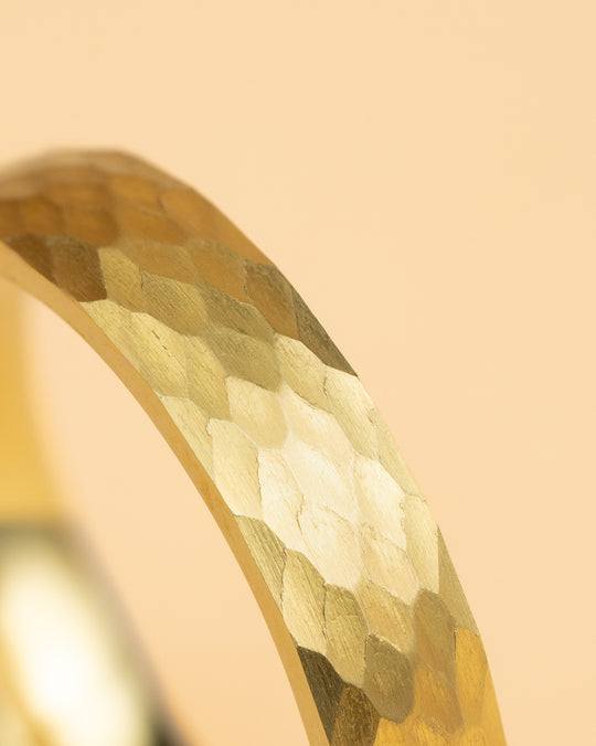 5mm Titanium ring with faceted gold finish