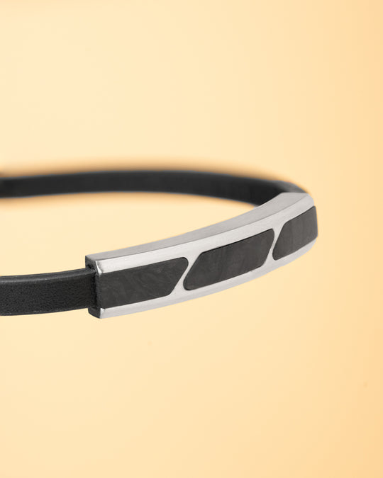 Black leather bracelet with forged carbon
