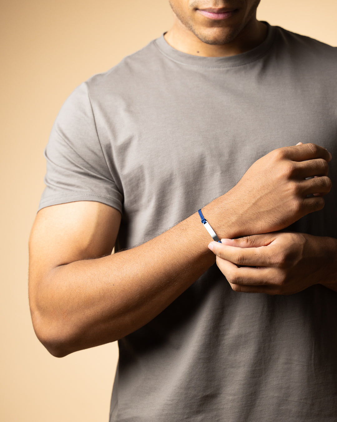 Blue nylon bracelet with an engraving plate