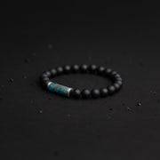 8mm beaded bracelet with a magnificent Grandidierite stone