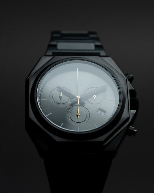 44mm Swiss chronograph watch with black case and strap