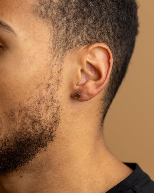 Voller Titanohrring mit Tigerauge-Stein