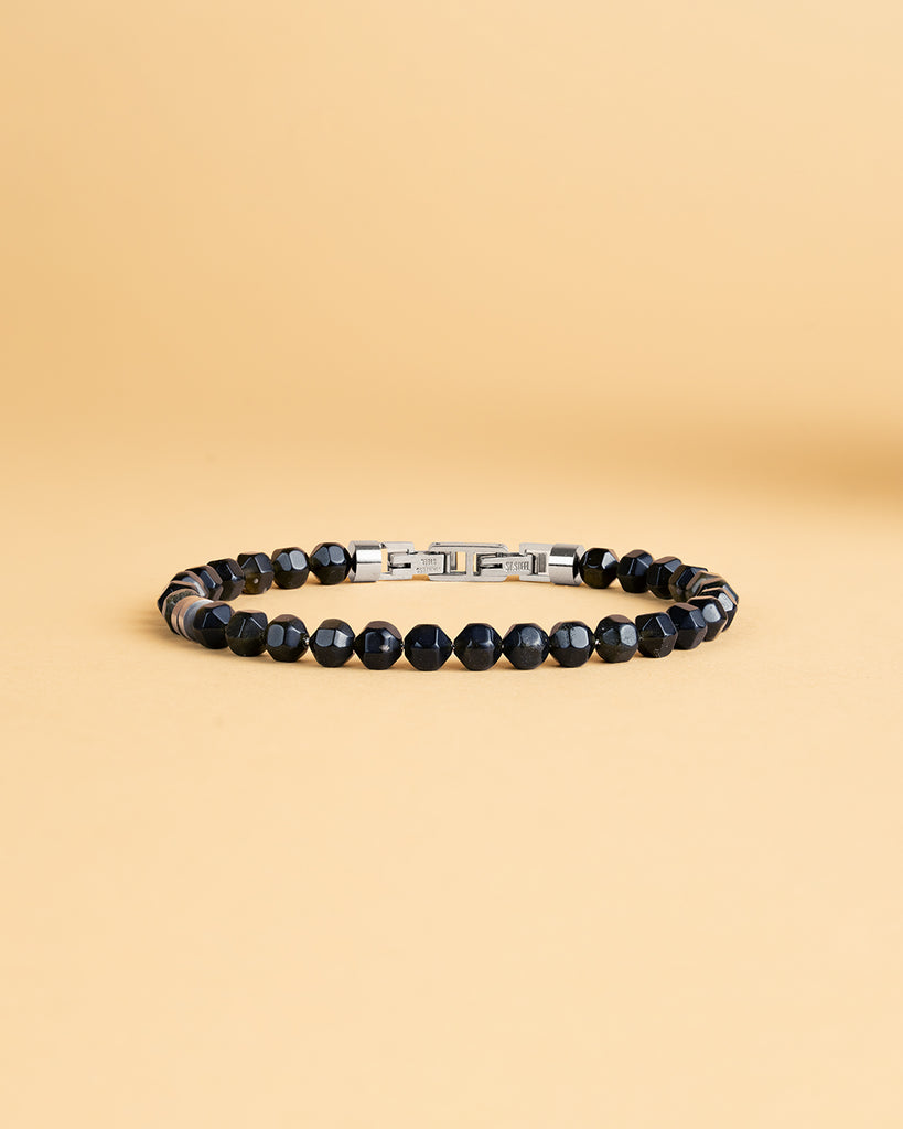 Bracelet with 6mm green Obsidian stone and titanium element