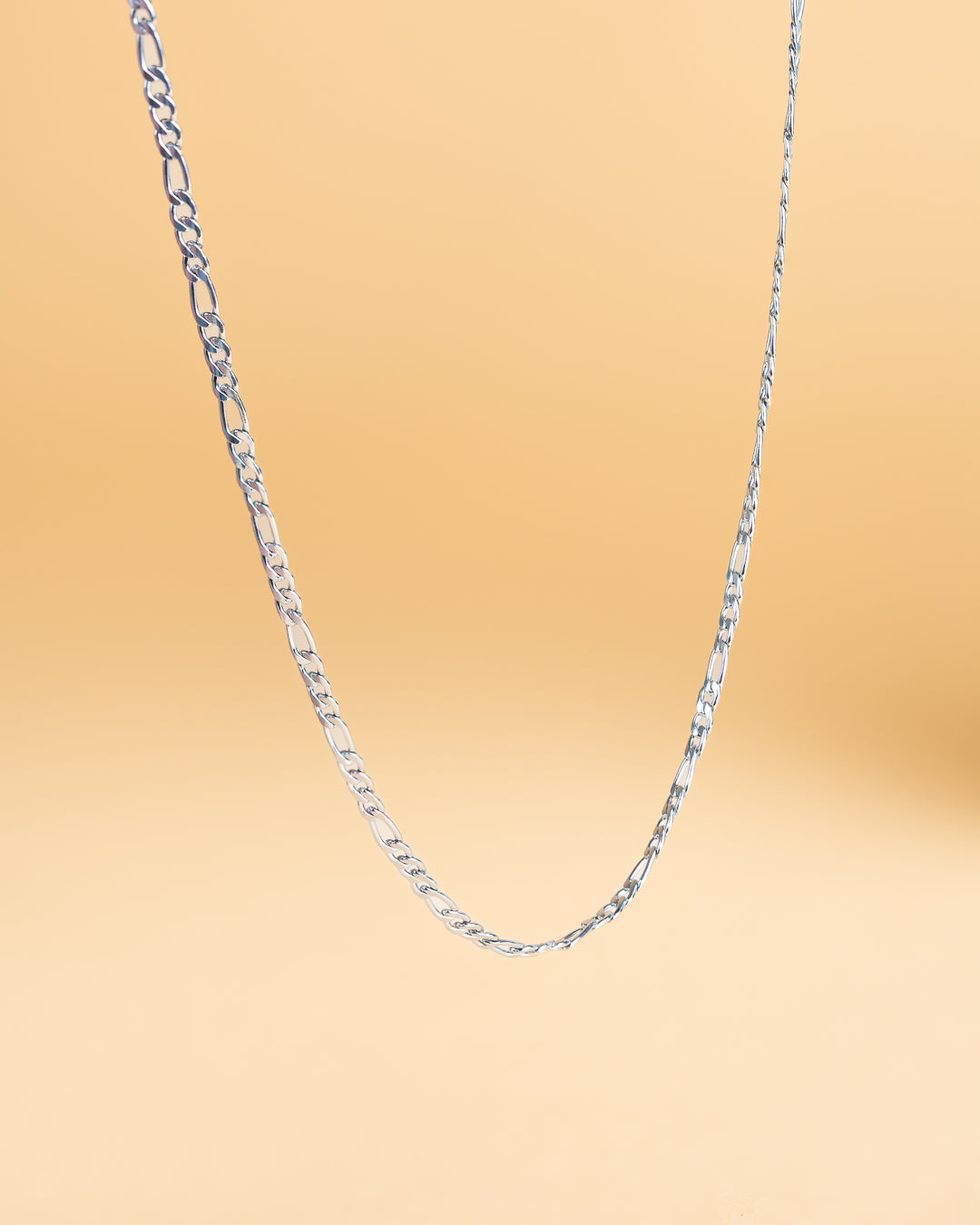 Collier et bracelet Figaro avec finition argentée