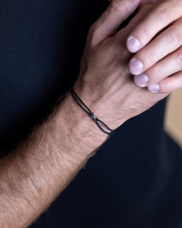 Bracelet en nylon noir de 1,5 mm avec un signe Infinity noir