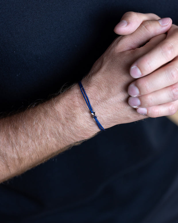 1,5 mm blauwe nylon armband met een verzilverd Infinity-teken
