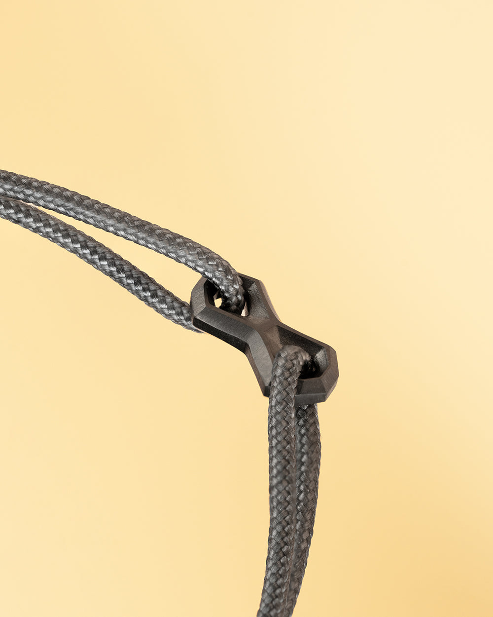 1.5mm Grey nylon bracelet with a black Infinity sign