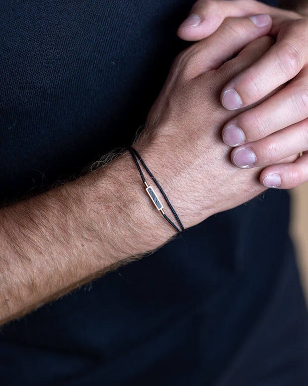 1.5mm Black nylon bracelet with a bronze-plated carbon element