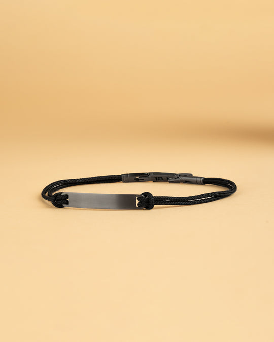 1.5mm black nylon bracelet with a stainless steel closing and black engraving plate