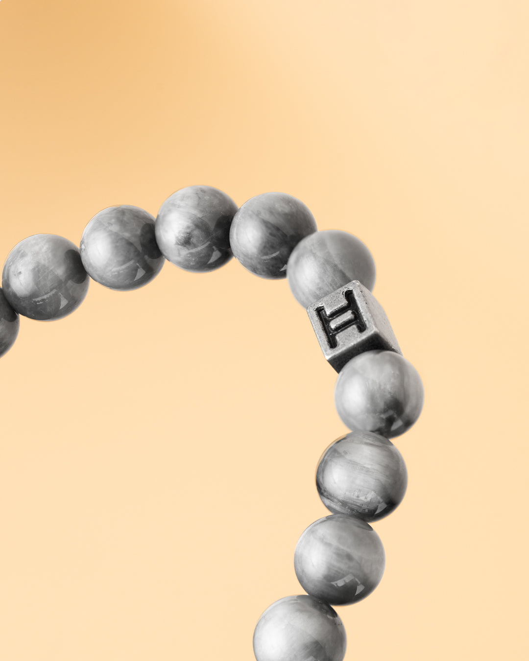 Cross bracelet with 8mm Hawk's eye stone