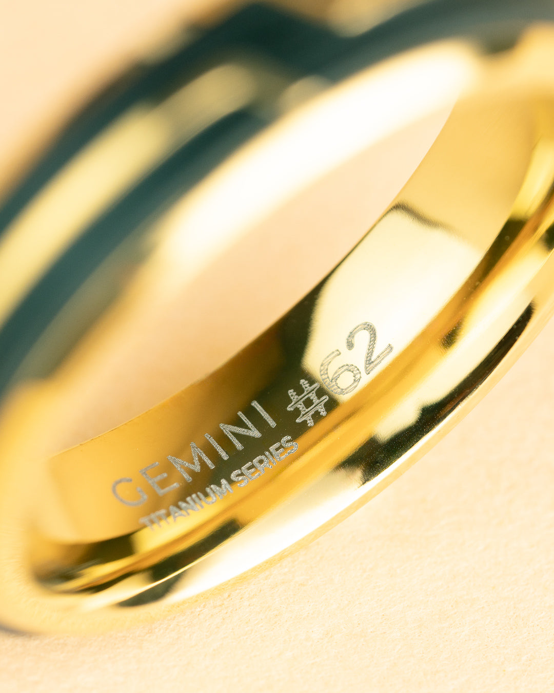 Gold-plated titanium ring with Forged Carbon finish