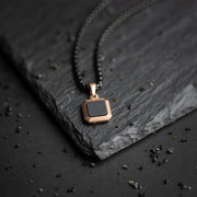 Bronskleurige halsketting uit staal en titanium met Agaat steen