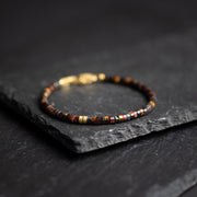 2mm Bracelet with mixed Tiger Eye stones and titanium element