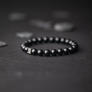 Armband mit 8 mm Onyx-Stein und schwarzem Zwischenstück