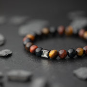 Bracelet avec pierre Oeil de Tigre 8mm en 3 couleurs
