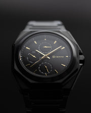 42 mm große Uhr aus Edelstahl mit schwarzem Finish und goldenen Details