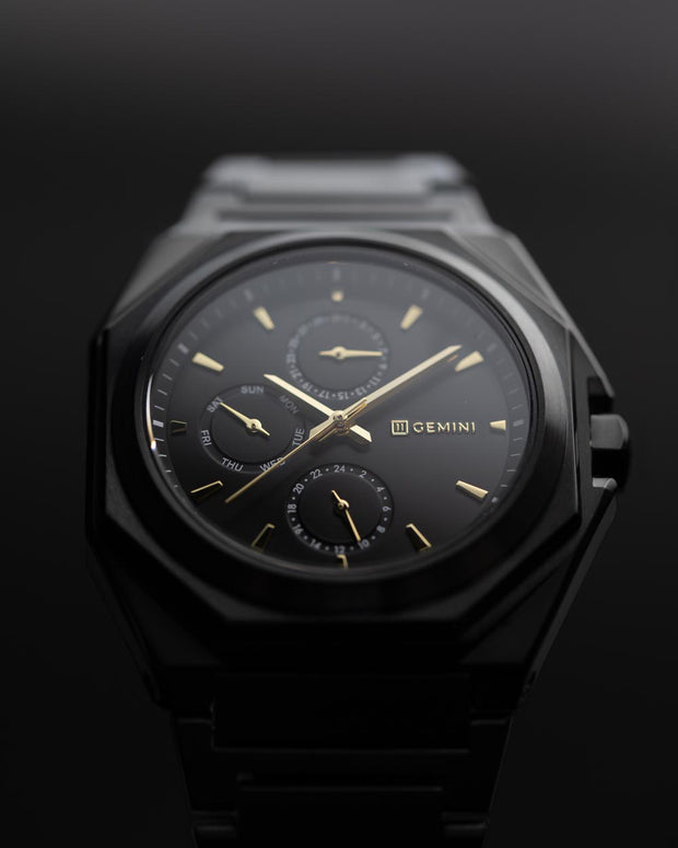 42mm full stainless steel watch with black finish and gold details