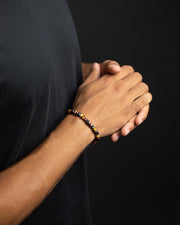 Exclusive bracelet with hand-cut Tiger Eye stone and 18k gold plating