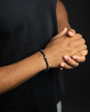 Bracelet avec Pierre de Lave noire de 6 mm et élément en titane